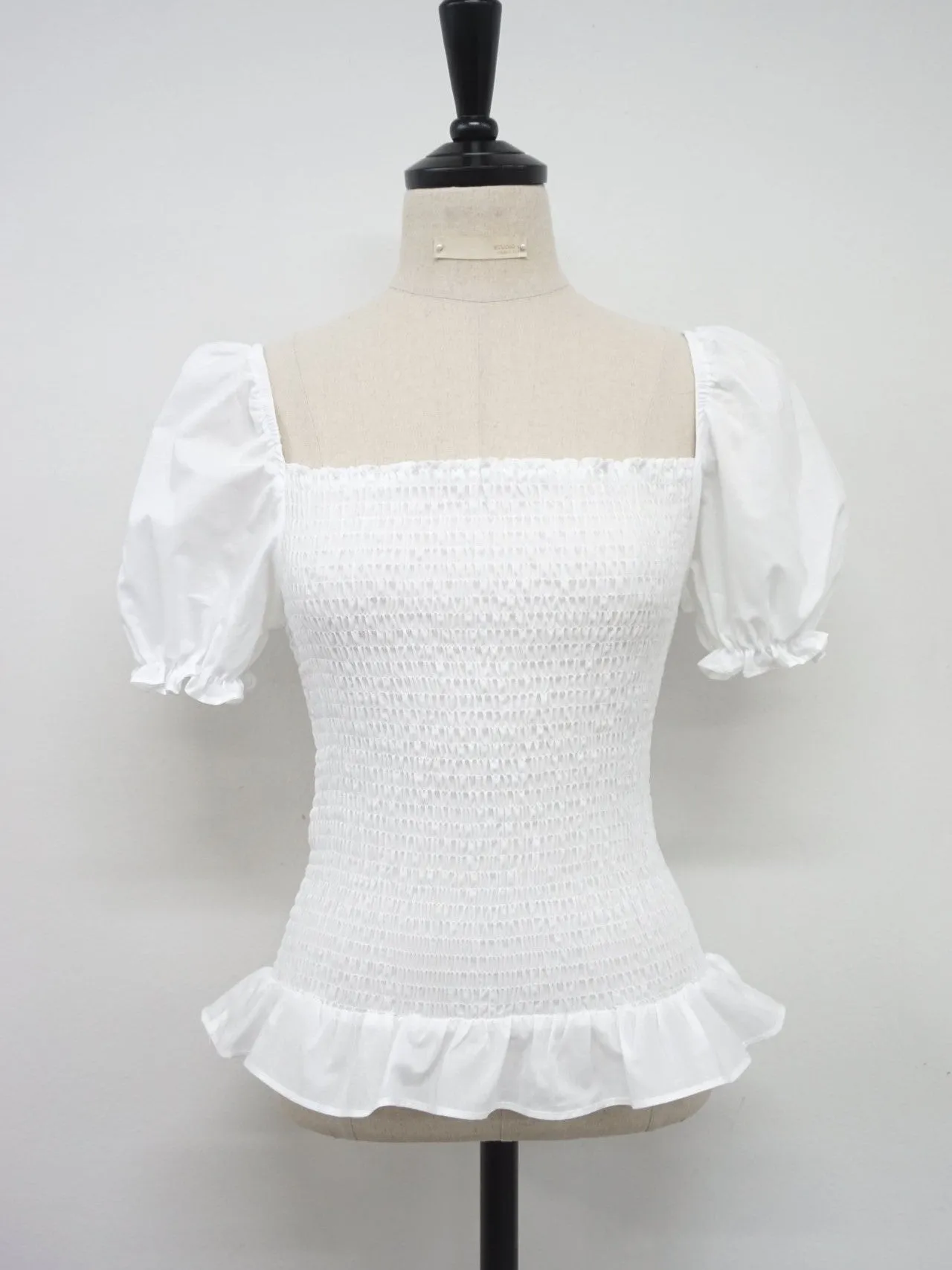 SHIRRED BLOUSE WITH RUFFLE HEM