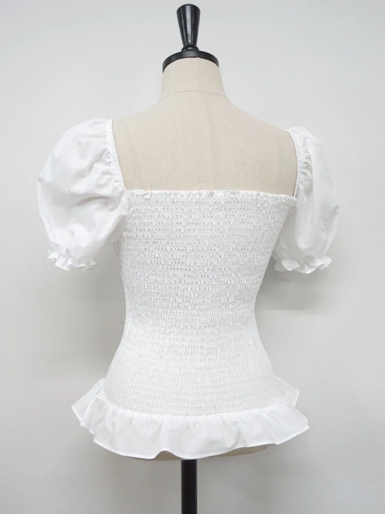 SHIRRED BLOUSE WITH RUFFLE HEM