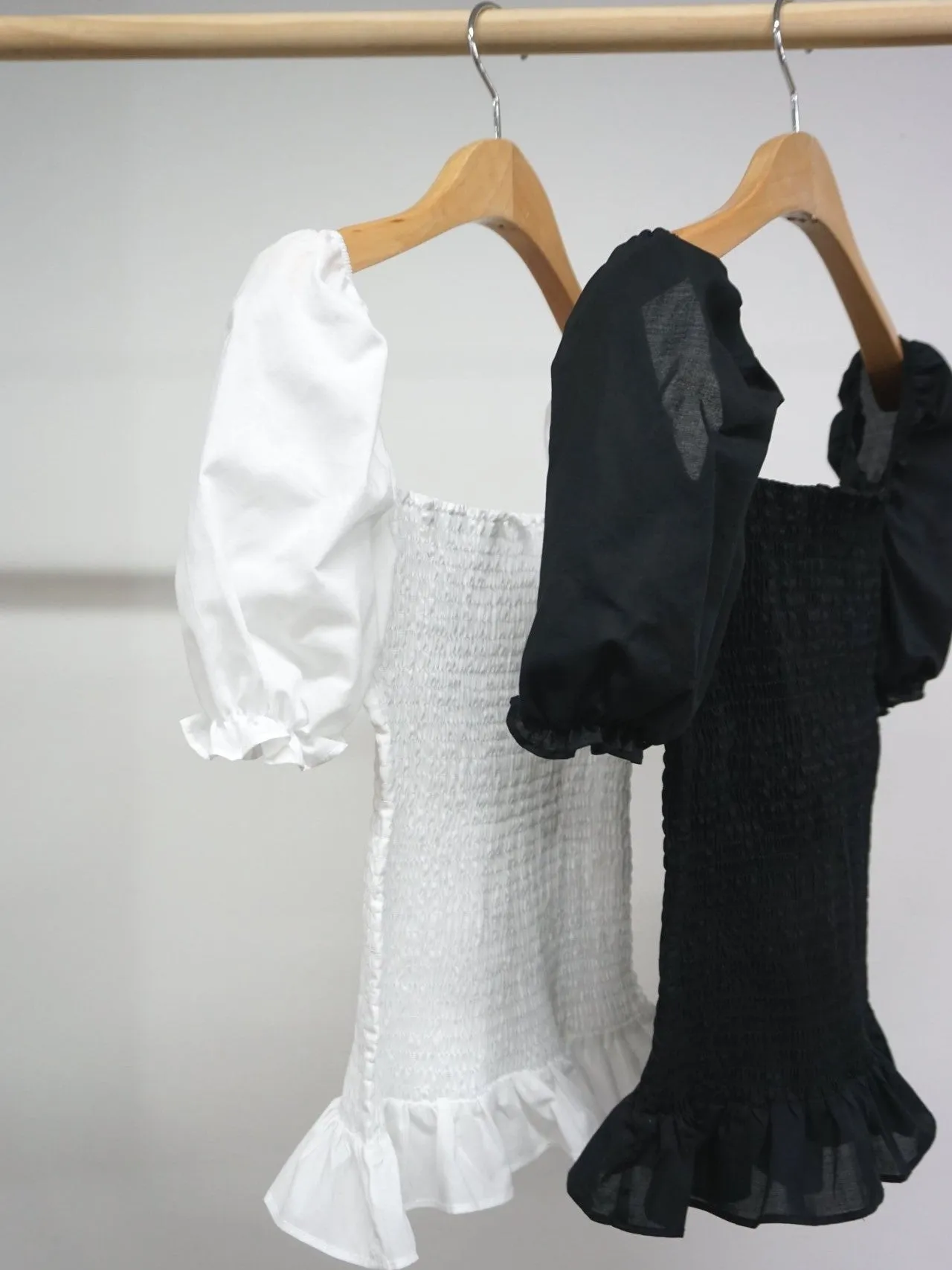 SHIRRED BLOUSE WITH RUFFLE HEM