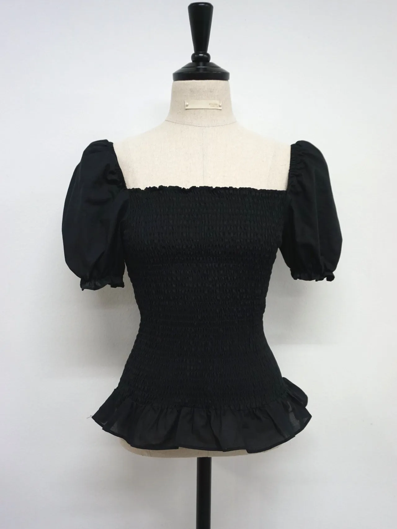 SHIRRED BLOUSE WITH RUFFLE HEM